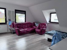 Wohnzimmer 2.OG links Renditestarkes Wohn- und Gesch�ftshaus mit 2 Gastronomiebetrieben & 5 Wohnungen - 6,6% Rendite