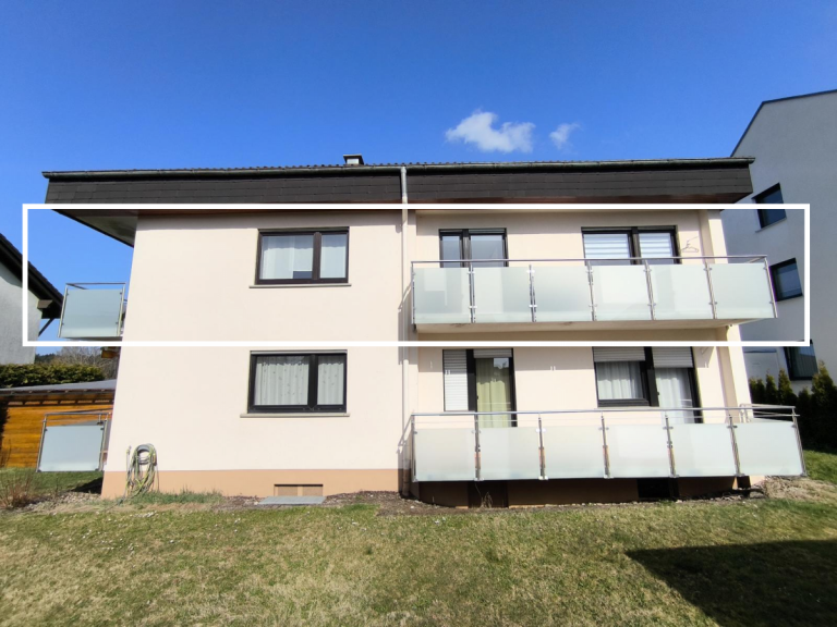 Geb�udeansicht R�ckseite Lo�burg Wohnung Sch�ne 4-Zimmer-Wohnung mit zwei Balkonen und Garage in Lo�burg zu verkaufen.